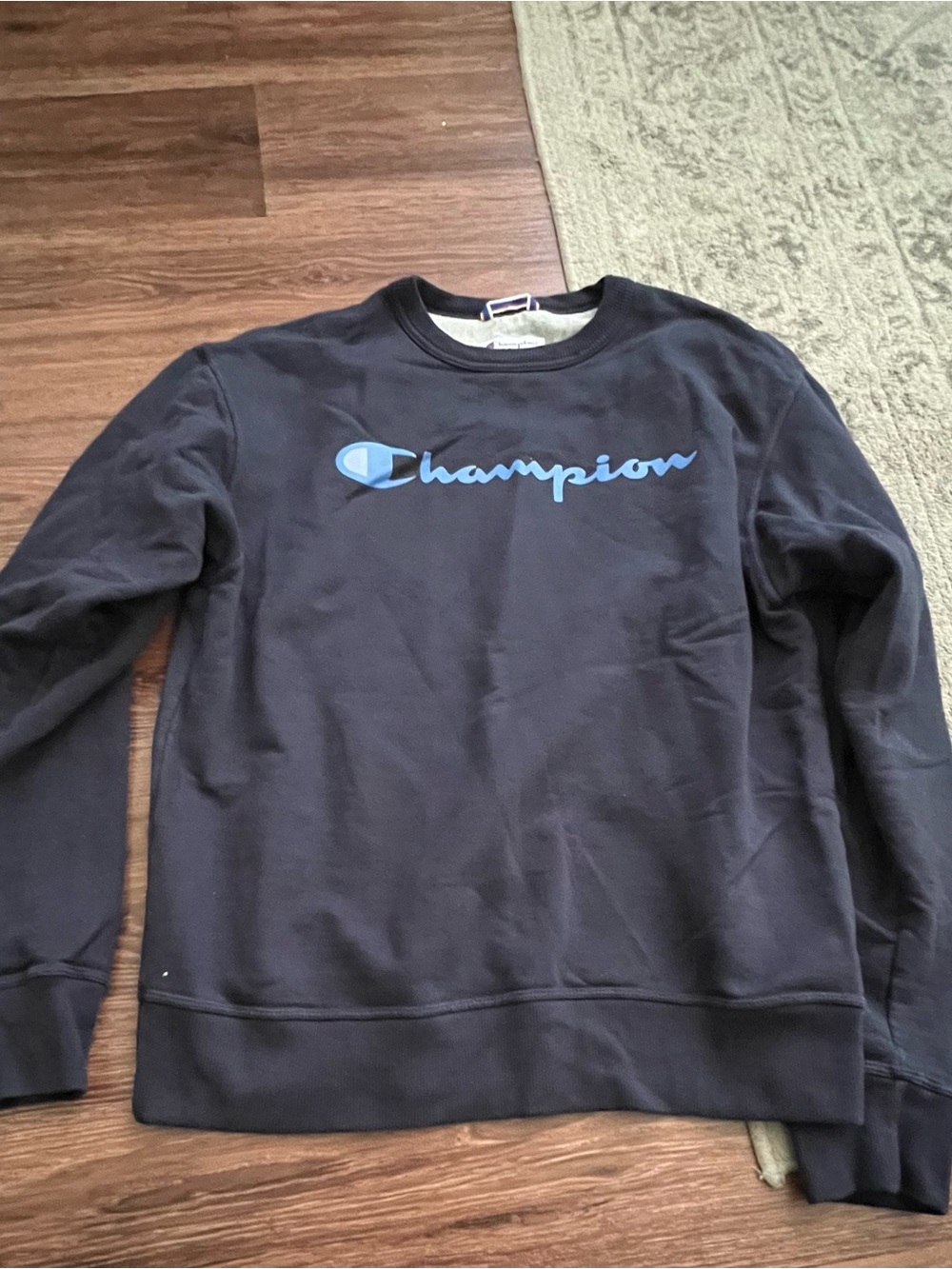 Champion Men's Black Crewneck Sweatshirt with Light Blue Logo